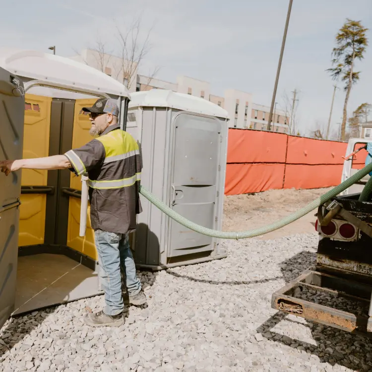 A&A Quick Pump Cleaning out an ADA compliant Portable toilet 
